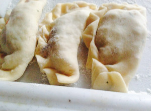 Фото Вареники с кислой капустой.