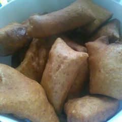 A picture of Mandazi with cinnamon #4weekschallenge#.