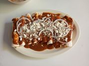 Una foto de enchilada de pollo