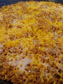Una foto de Arroz de magro y parmesano