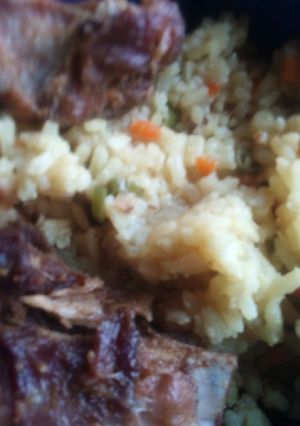 A picture of Fried rice with goat meat.