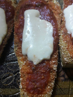Una foto de Milanesas de berenjena a la napolitana