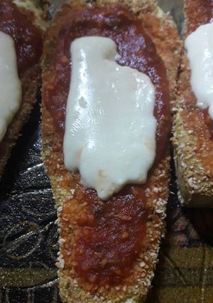 Una foto de Milanesas de berenjena a la napolitana