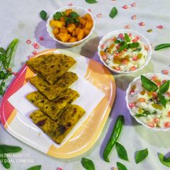 A picture of Curd Rice with Potato fry and Palak Roti Thepla.
