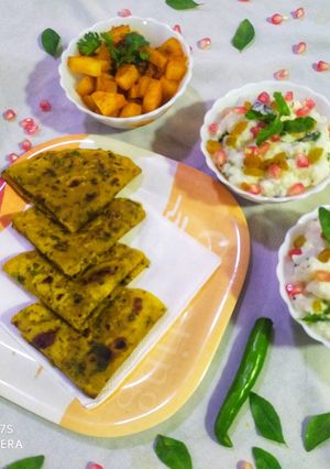 A picture of Curd Rice with Potato fry and Palak Roti Thepla.