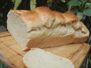 Una foto de pan con mandarinas