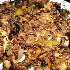 A picture of Nadan idicha kozh/ Crushed chicken.