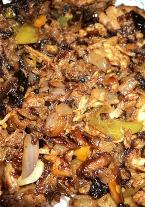 A picture of Nadan idicha kozh/ Crushed chicken.
