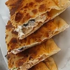 A picture of Crispy Pizza Paratha😋😋😋.