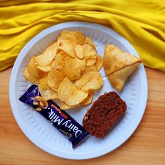 A picture of Samosa and cake (best birthday snacks).
