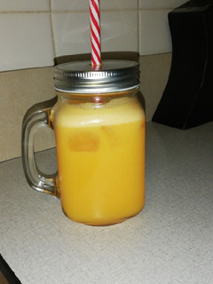 A picture of Freshly squeezed orange and ginger juice.
