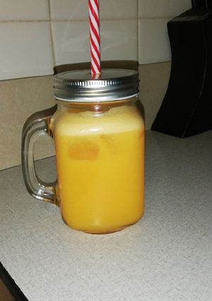A picture of Freshly squeezed orange and ginger juice.
