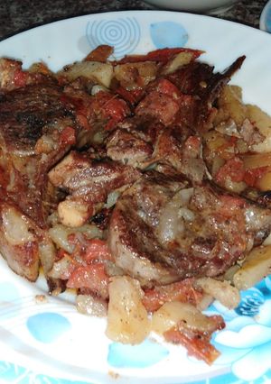 A picture of Lamb Chops with Vegetables.