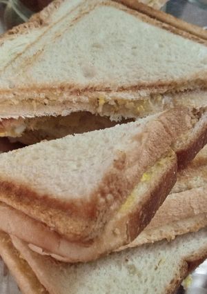 A picture of Egg chicken sandwich with YUMMy Tea.