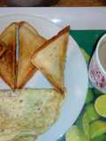 Toasted bread,fried Eggs and Hot Choco
