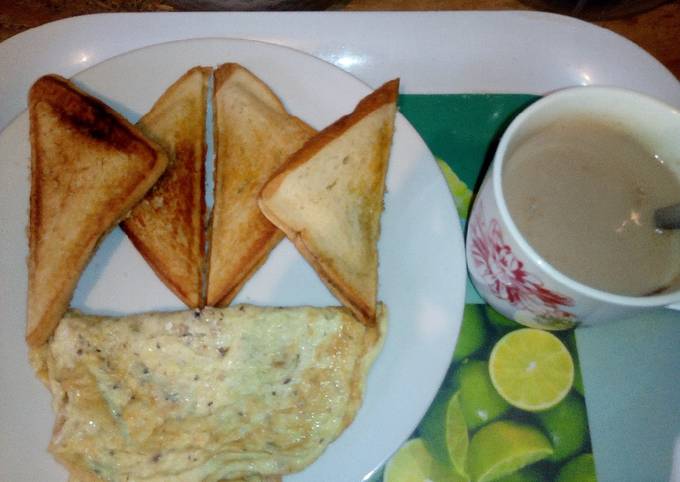 Toasted bread,fried Eggs and Hot Choco