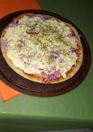 Una foto de Pizza de harina integral