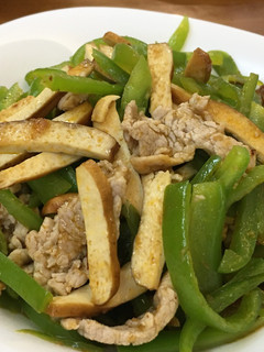 A picture of Stir-Fried Green Peppers with Tofu.