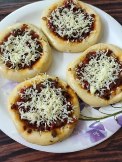 A picture of Mini Cheese Pizza 🍕.