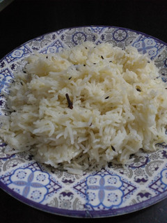 A picture of Baghar waly rice with three spices.