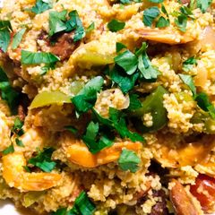 A picture of Couscous with prawns and sausage.