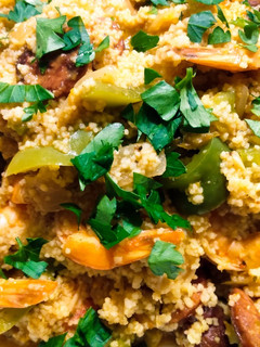 A picture of Couscous with prawns and sausage.