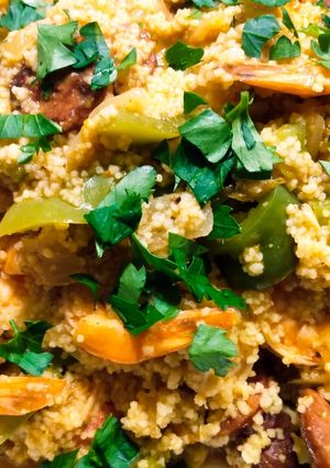 A picture of Couscous with prawns and sausage.