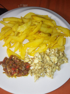 A picture of Fried chips with egg and sauce #KADUNACOOKOUT.