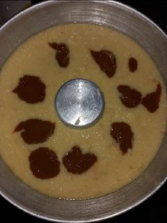 Una foto de Budín de pan con dulce de leche