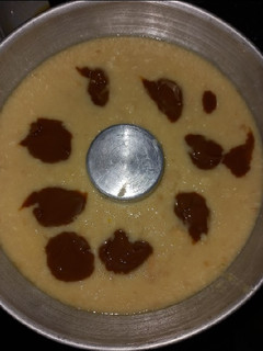 Una foto de Budín de pan con dulce de leche