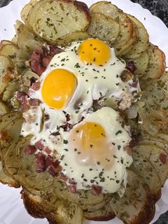 Una foto de 540. Flor de huevos rotos (picoteo)
