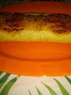 Una foto de Pizza arrollada