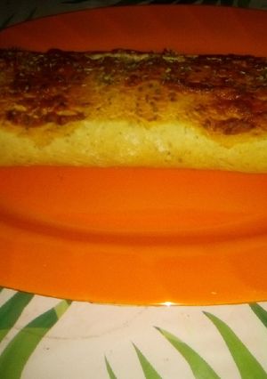 Una foto de Pizza arrollada