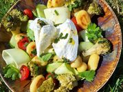 Une photo de gnocchi sauce tomates