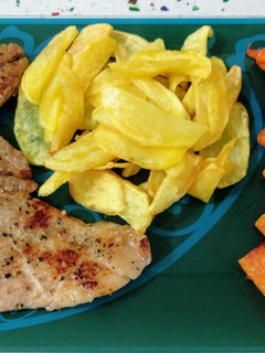 Una foto de Secreto y presa ibérica a la plancha con patatas y calabaza fritas