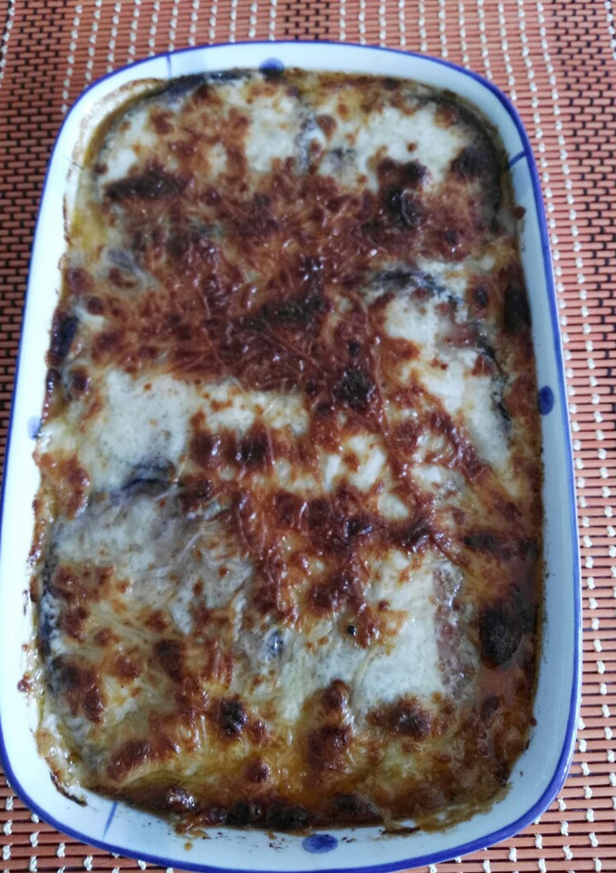 Una foto de Pastel vegetariano de berenjena, tomate y queso