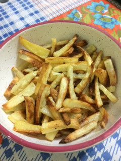 Una foto de Papas fritas bien crocantes al horno