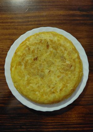 Una foto de Tortilla de patatas con cebolla