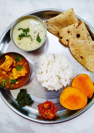 A picture of Satvik food-Gujarati thali.