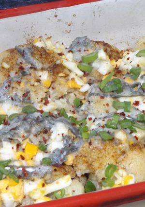 Una foto de Coliflor horneado al pimentón con queso picante