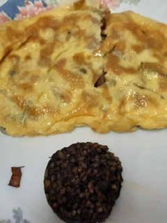 Una foto de Tortilla de puerros y champiñones