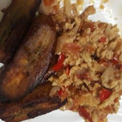 A picture of Fried egg and fried plantain.