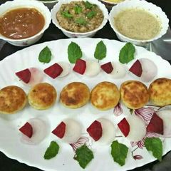 Litti chokha wth tamarind and mustard chutney A picture of Litti chokha wth tamarind and mustard chutney.