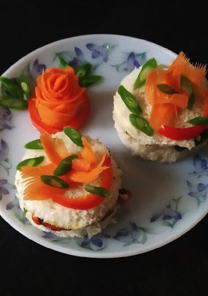 A picture of Sandwich with mix boil vegetables.