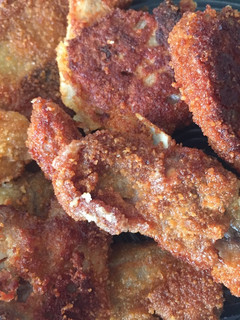 Una foto de Costillas de cabrito a la milanesa