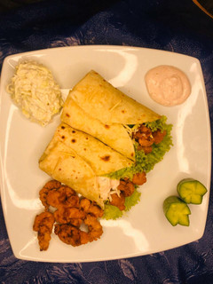 A picture of Zinger roll with tortilla bread.