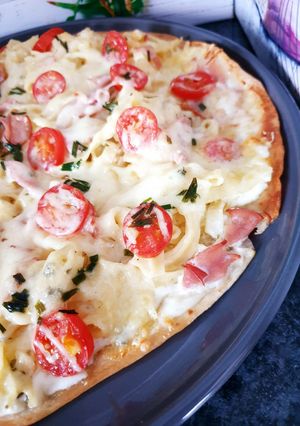Une photo de Pizza 🍕 wrap tagliatelles bacon 🥓 mozzarella gruyère râpé