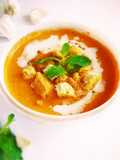Creamy tomato soup with bread toast