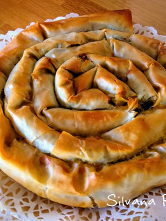 Una foto de 82.🥮Spanakopita (Pastel griego de espinacas🥬y queso feta🧀)