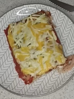 Una foto de Canelones sabor pizza